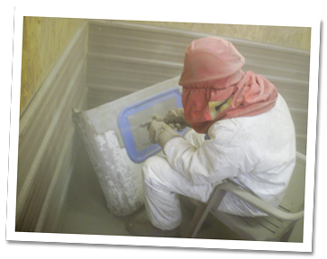 Steve sandblasting the winter cab