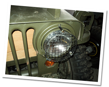 Rock guard over headlight