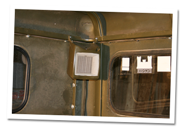 Heater mounted in rear corner of winter cab