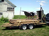 green jeanne's m100 trailer loaded for the trip home